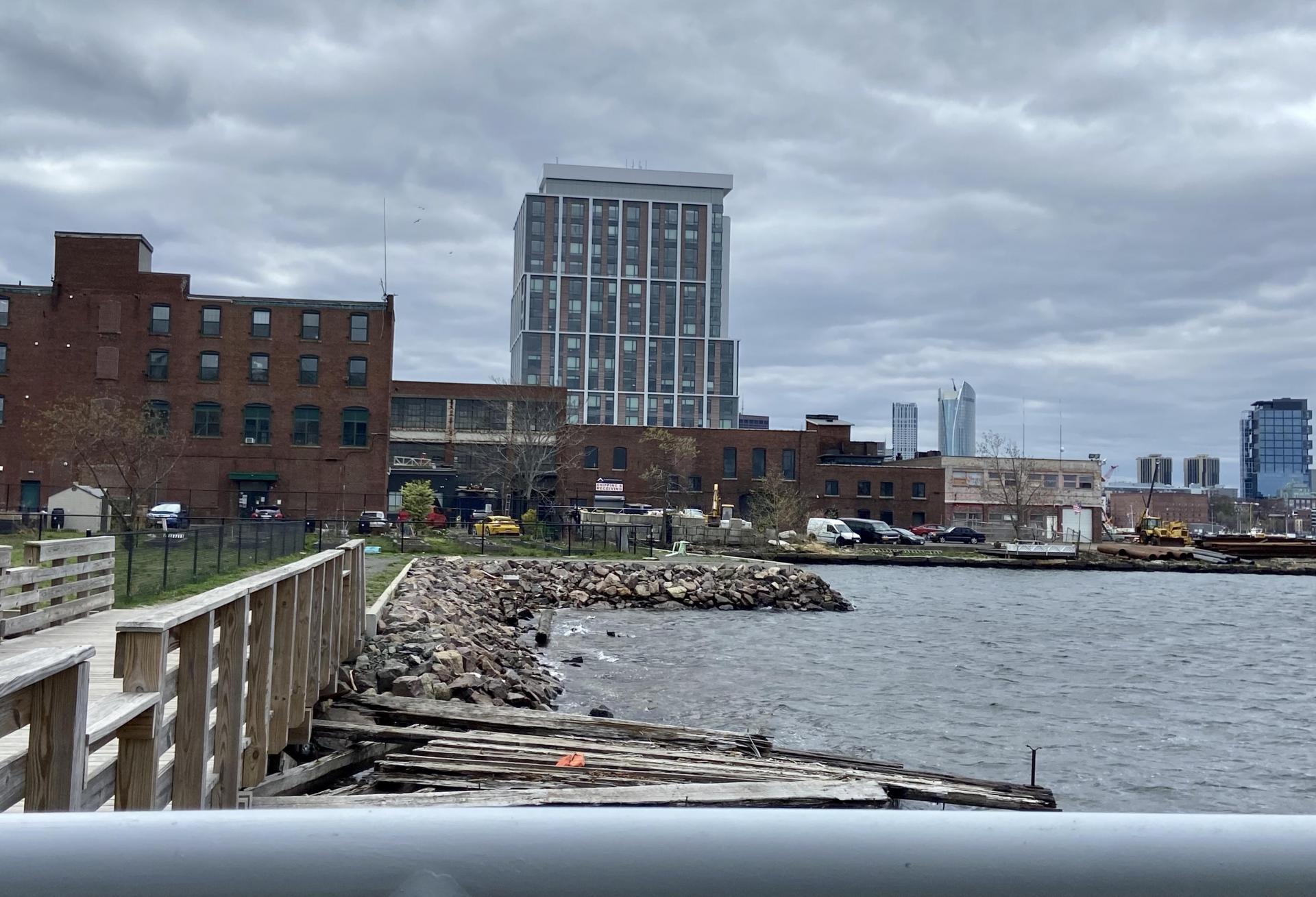 Parts of East Boston's waterfront are lined with old, rusted buildings or vacant parcels due to restrictive zoning that has barred any type of use that is not water-dependent industrial.