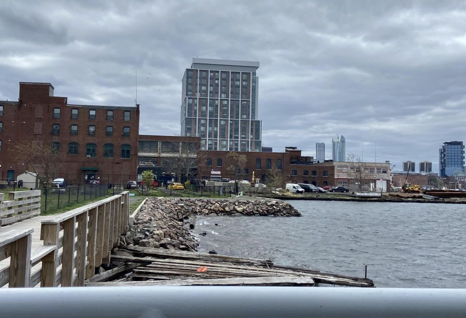 Parts of East Boston's waterfront are lined with old, rusted buildings or vacant parcels due to restrictive zoning that has barred any type of use that is not water-dependent industrial.