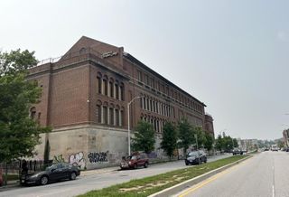 Former College Building In Developing East Baltimore Area Sells For $3.4M