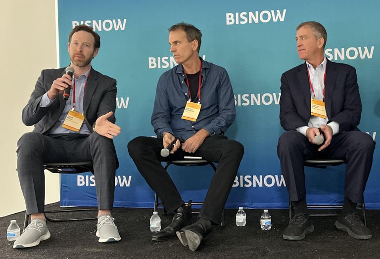 Cushman & Wakefield's Kevin Kelly, The Malin's Charlie Robinson and Empire State Realty Trust's Thomas Durel onstage at Bisnow's 2023 New York Office event.