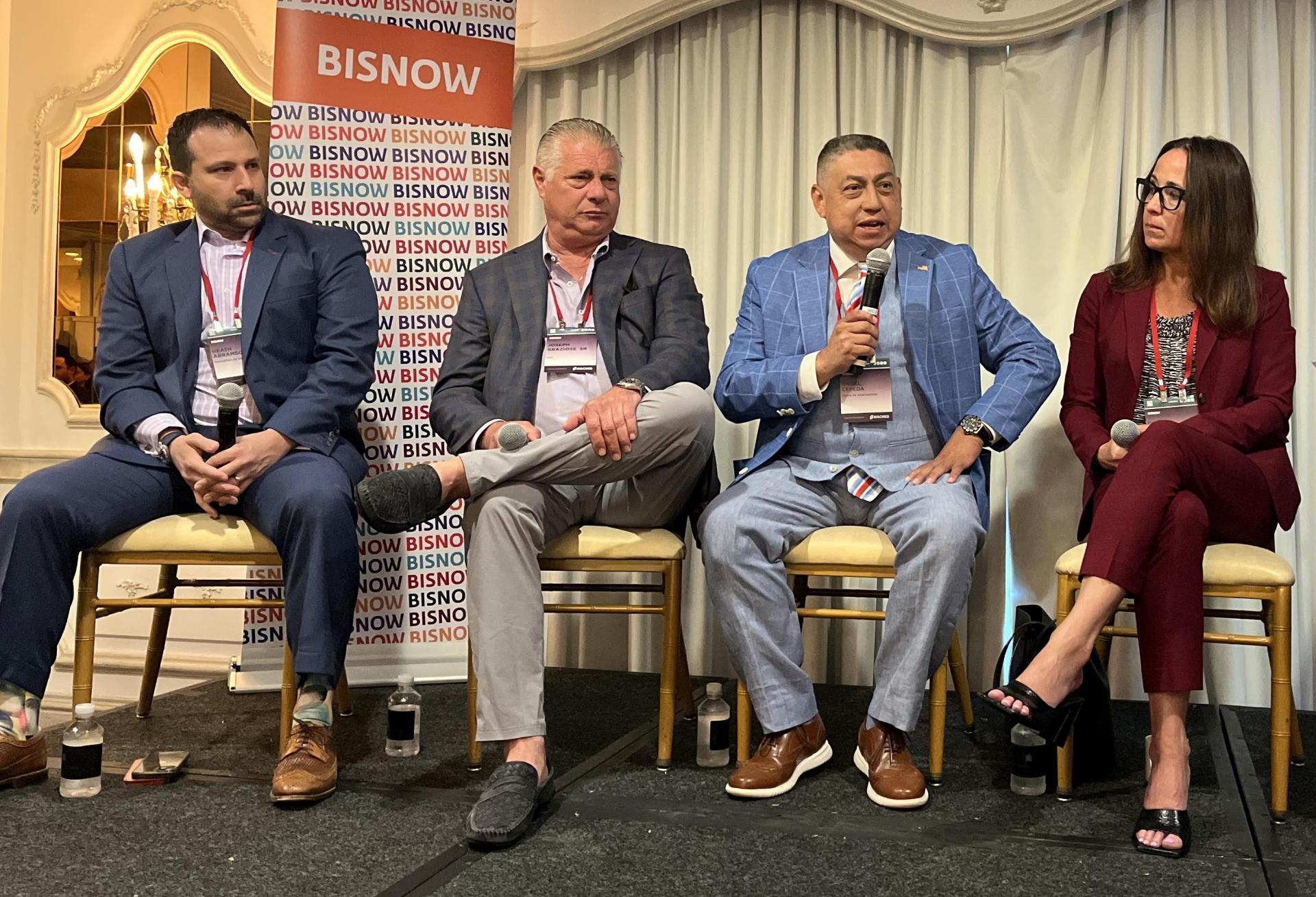 Rockefeller Group's Heath Abramsohn, RXR's Joseph Graziose Sr., Huntington's Angel Cepeda and Community Development Corporation of Long Island's Gwen O'Shea on stage at Bisnow's Long Island 2023 State of the Market event.