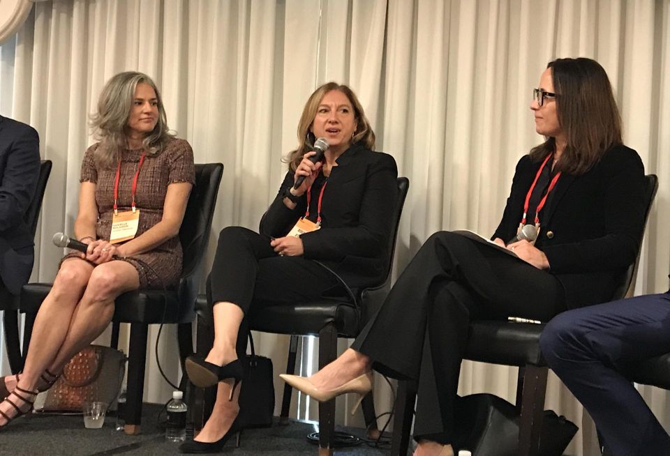 AvalonBay Communities' Danielle Molaison, RXR's Rebecca D’Eloia and Community Development Corporation of Long Island's Gwen O’Shea on stage at Bisnow's 2022 Long Island State Of The Market event.