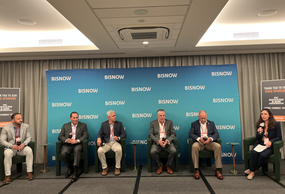 SourceBlue's Louis Martinelli, Shawmut Design and Construction's Charles Avolio, The Baldwin Group's Rob Rapp, L&L Holding Co.'s Kevin Hoey, RXR's Jason Roberts and Thompson Hine's Sarah Sparer onstage at Bisnow's 2025 New York Construction and Development Conference.