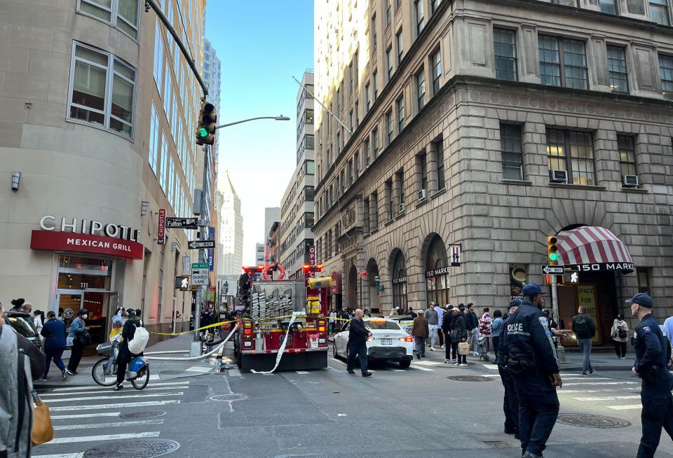 FDNY and the NYPD closed off the streets surrounding the Ann Street garage in the immediate aftermath of the collapse on April 19, 2023.