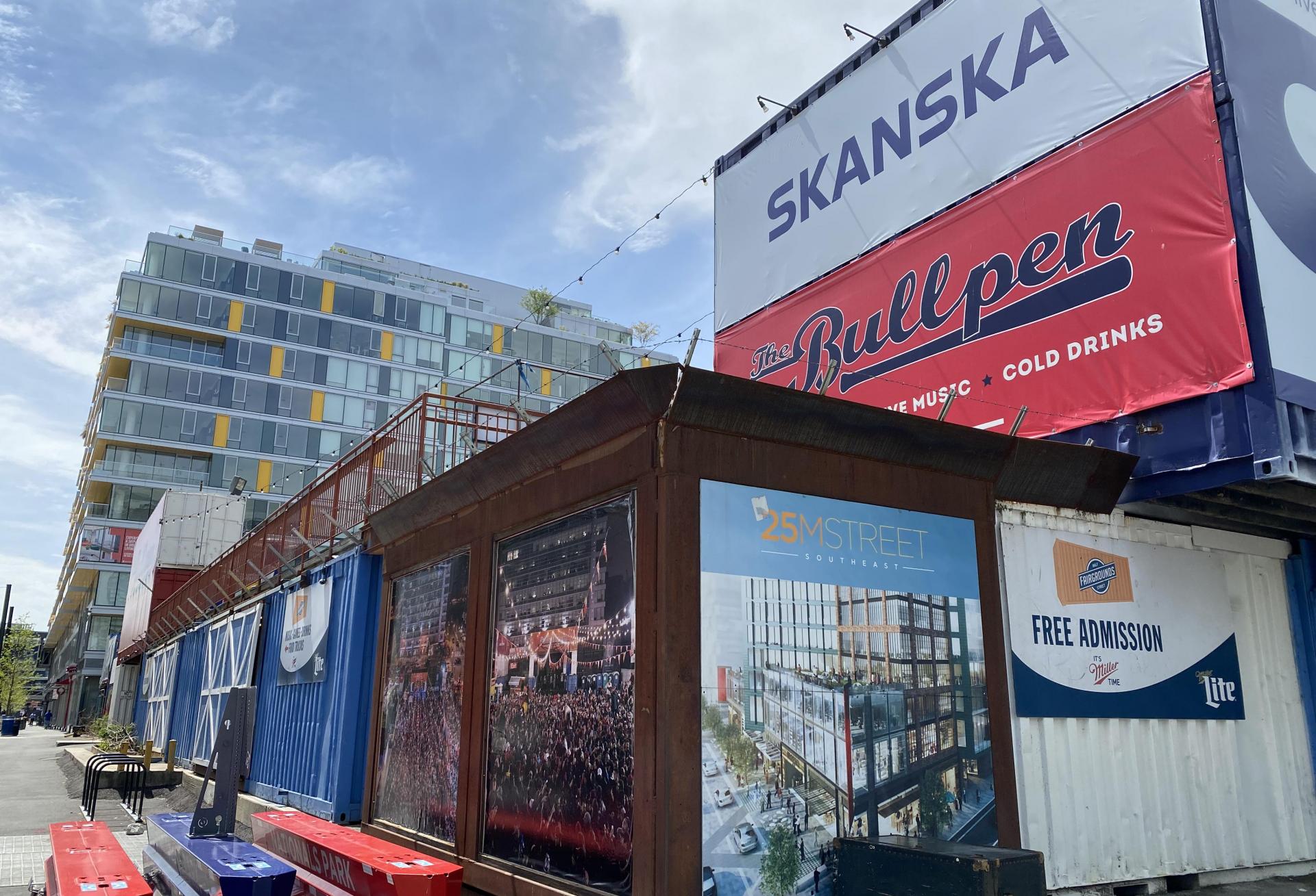 Exterior of The Bullpen with Skanska billboard in view