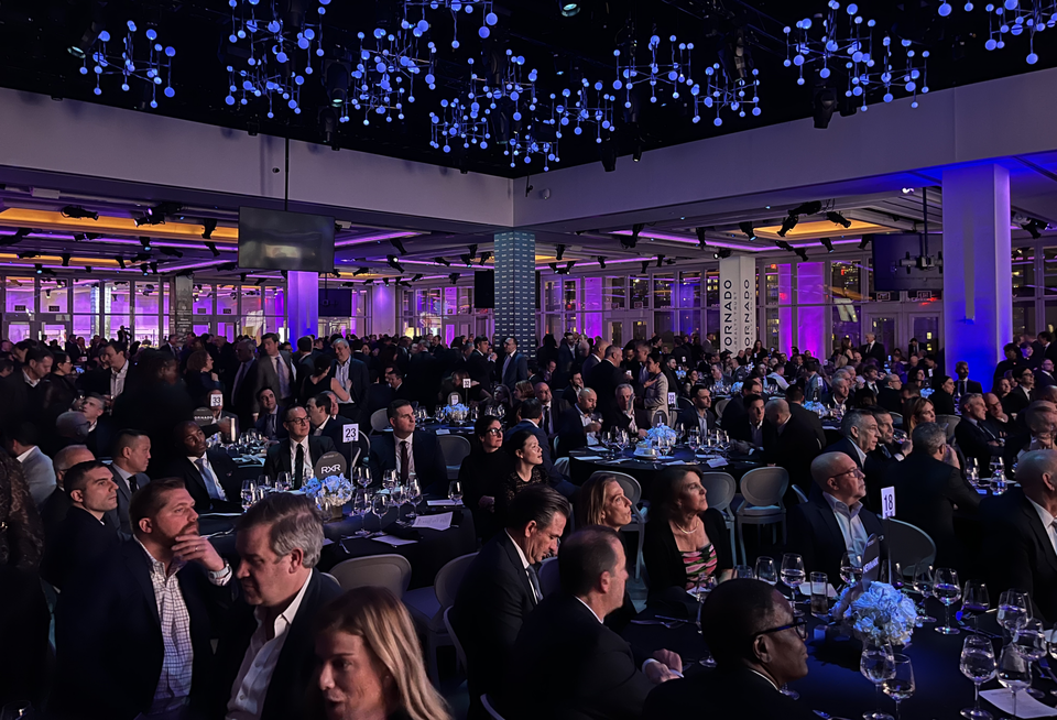 The thousand-strong crowd listening and chatting as awards are presented at REBNY's 129th Gala.
