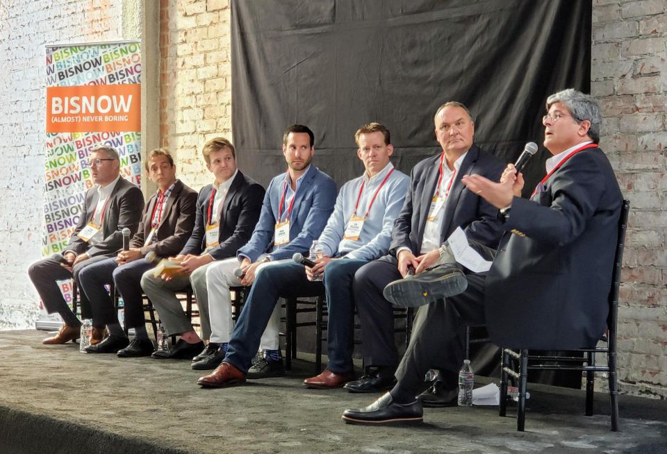 From L to R: Hackman Capital Partners' Ryan Smith, Meridian Capital's Seth Grossman, CBRE's Michael Longo, Cushman & Wakefield's Mike Condon, Paragon Commercial Group's Jim Dillavou, Avison Young's Jonathan Larsen and George Smith Partners Gary Tenzer at Bisnow's Los Angeles State of the Market at the Trust Building in downtown Los Angeles.