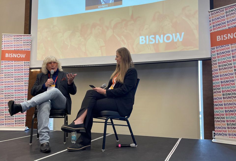 Tom Ryan, co-founder, Smashburger and Tom's Watch Bar, talks to Bisnow business manager Breanne McCabe during a keynote conversation at Bisnow's Nov. 7 Denver Sports & Entertainment event.