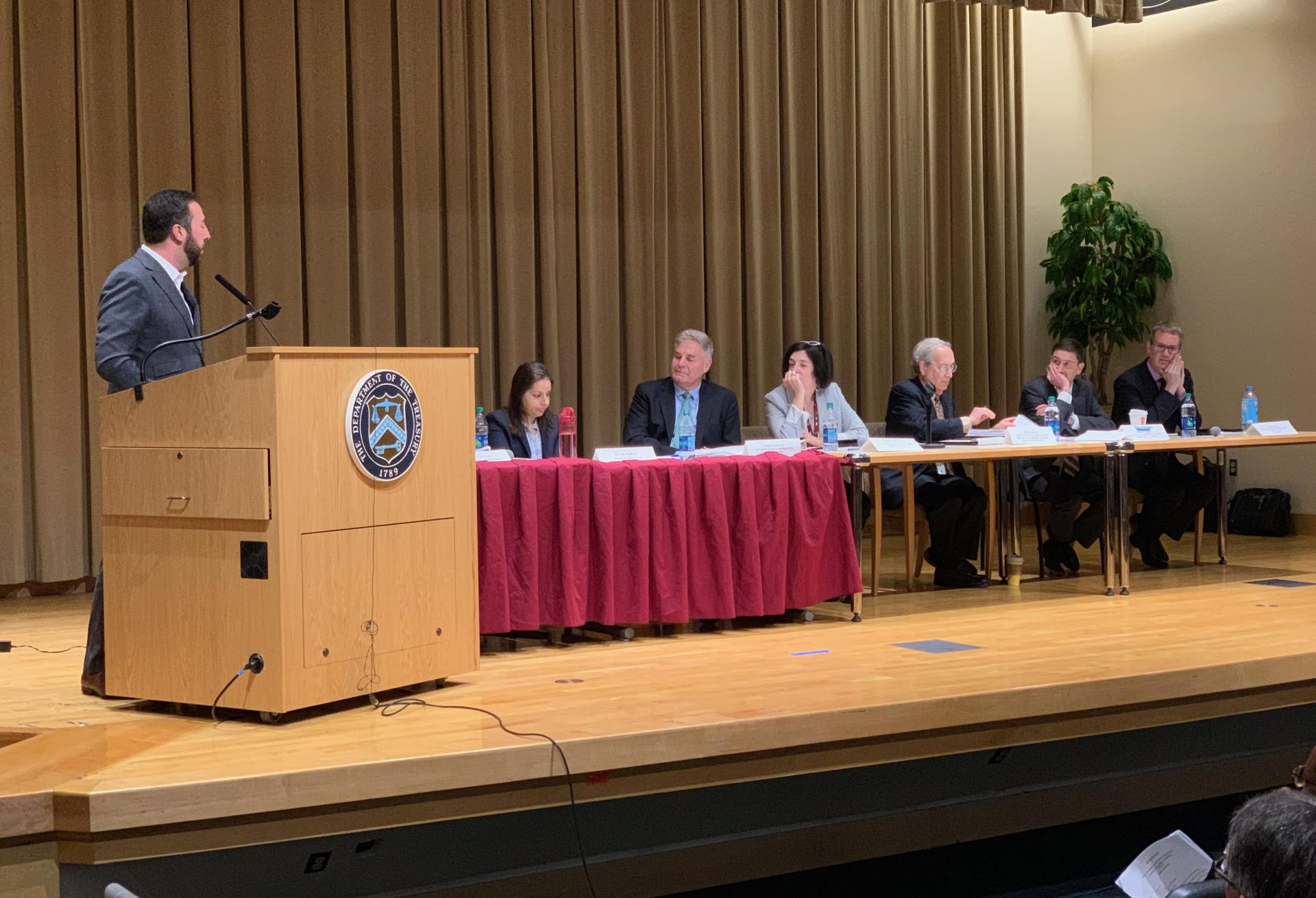 Develop LLC founder Steve Glickman speaks to a panel of IRS and Department of Treasury officials at an opportunity zone hearing July 9, 2019