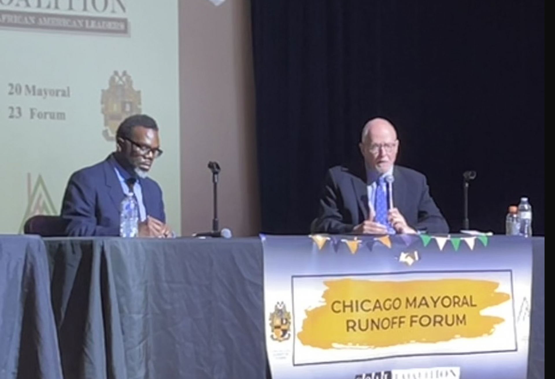 A mayoral forum held at Kenwood Academy in March 2023 between runoff candidates Brandon Johnson and Paul Vallas.
