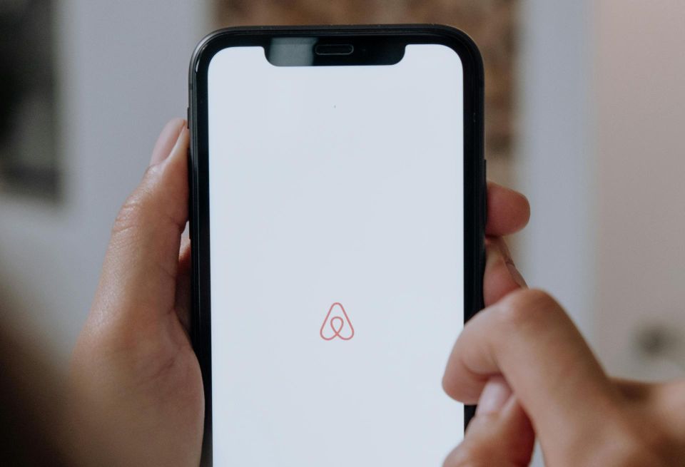the Airbnb app on an iPhone