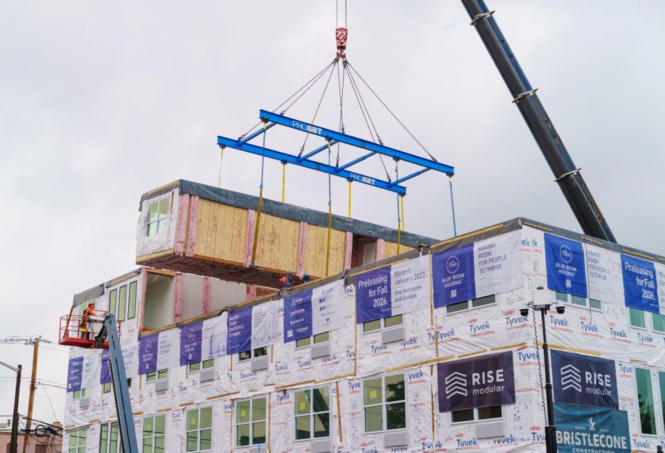 Modular housing units were placed at 817 W. Eighth Ave. in Denver as part of the Blue Room House One development in late June 2026.