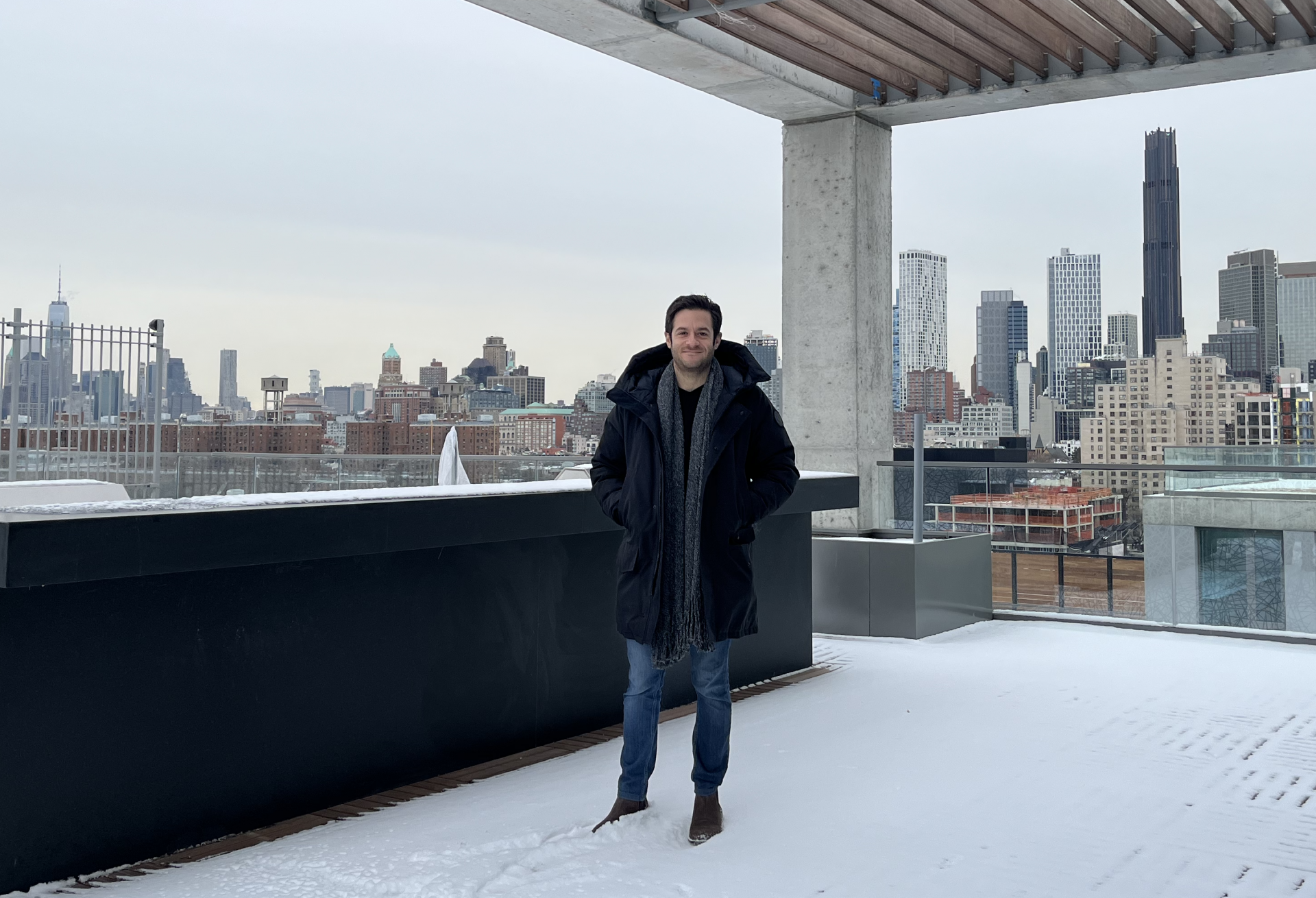 Charney Cos.' Justin Pelsinger on the rooftop of the 224-unit Gowanus multifamily building Union Channel.