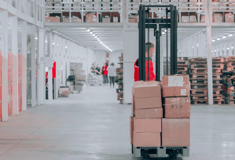 A forklift in a warehouse 