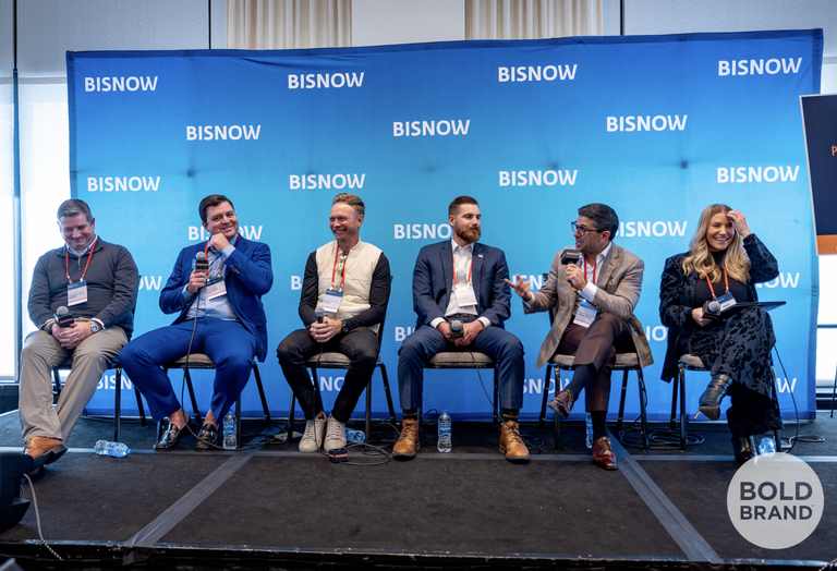 A high-resolution professional photo of the Development and Operations: Running Smarter Buildings panel at Bisnow's Multifamily Annual Conference Rockies