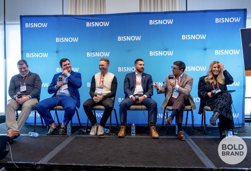 A high-resolution professional photo of the Development and Operations: Running Smarter Buildings panel at Bisnow's Multifamily Annual Conference Rockies
