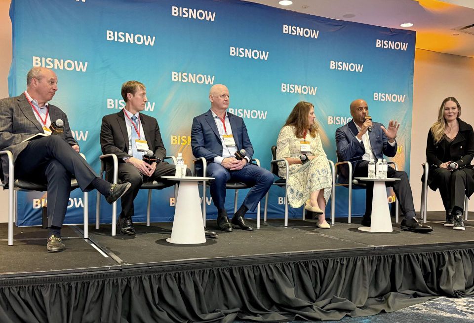 Evolution Sustainability Group's Chuck Hurchalla, Innvision Hospitality's Chris Parker, Hotel Equities Group's Sean Williams, Whiting-Turner Contracting's Courtney Moore, Wyndham's Brian Parker and Luxury Lifestyle Leader's Rika Lisslö onstage at Bisnow's 2026 National Hospitality Conference.