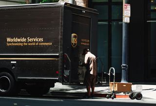 Amazon, UPS Cut Thousands Of Office Jobs To Improve Efficiencies