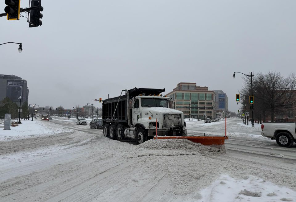 Snow plow takes care of roads in Washington, D.C. during Winter Storm Fern.