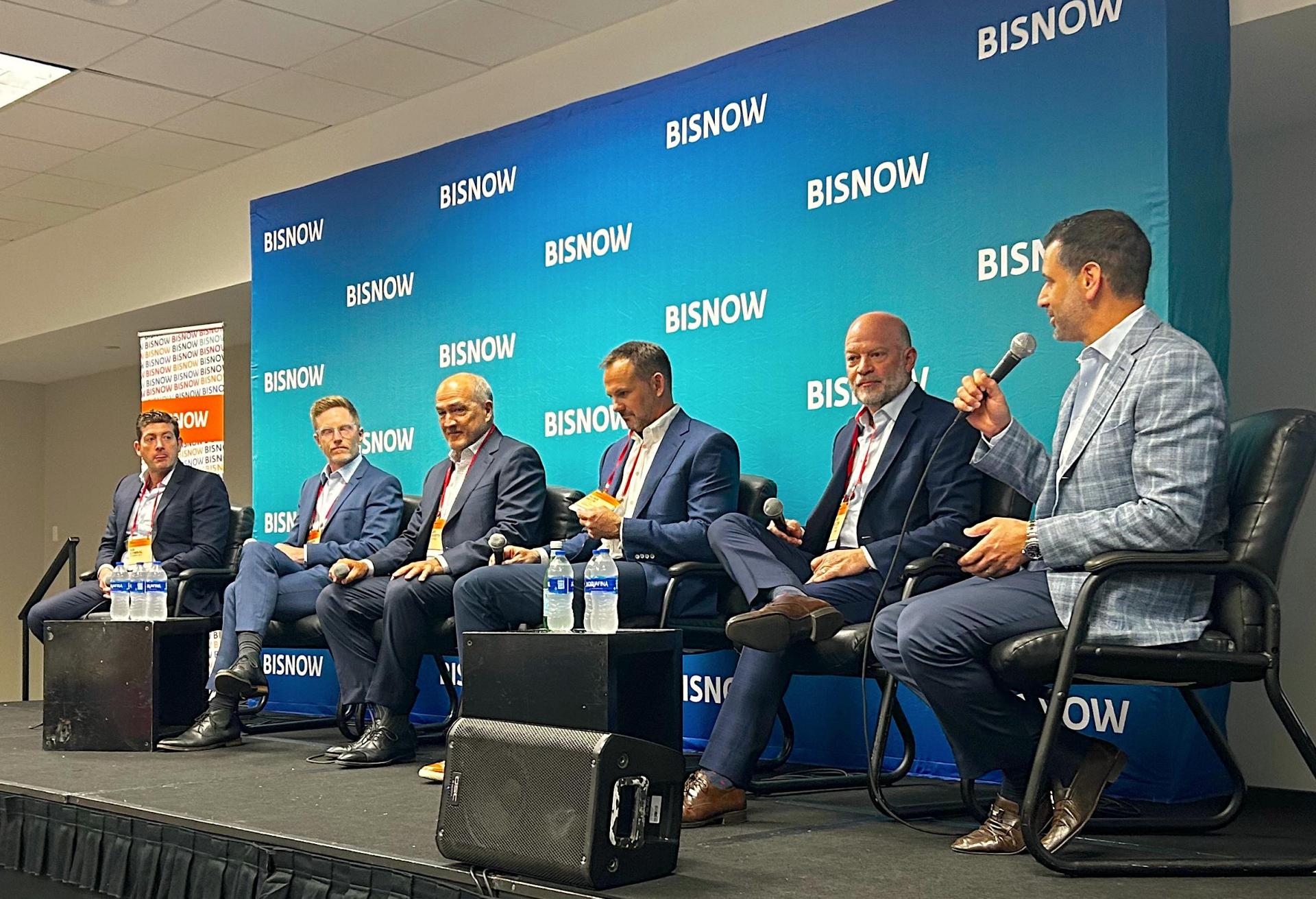 Cymbal DLT's Asi Cymbał, Ocean Land's Brandon Spirk, Suffolk's Jay Fayette, Juneau Construction Co.'s Russ Beck, Two Road's Development's Brad Meltzer and Global Pro's Daniel Odess on a panel at Bisnow's Construction and Development event in Miami on May 24.
