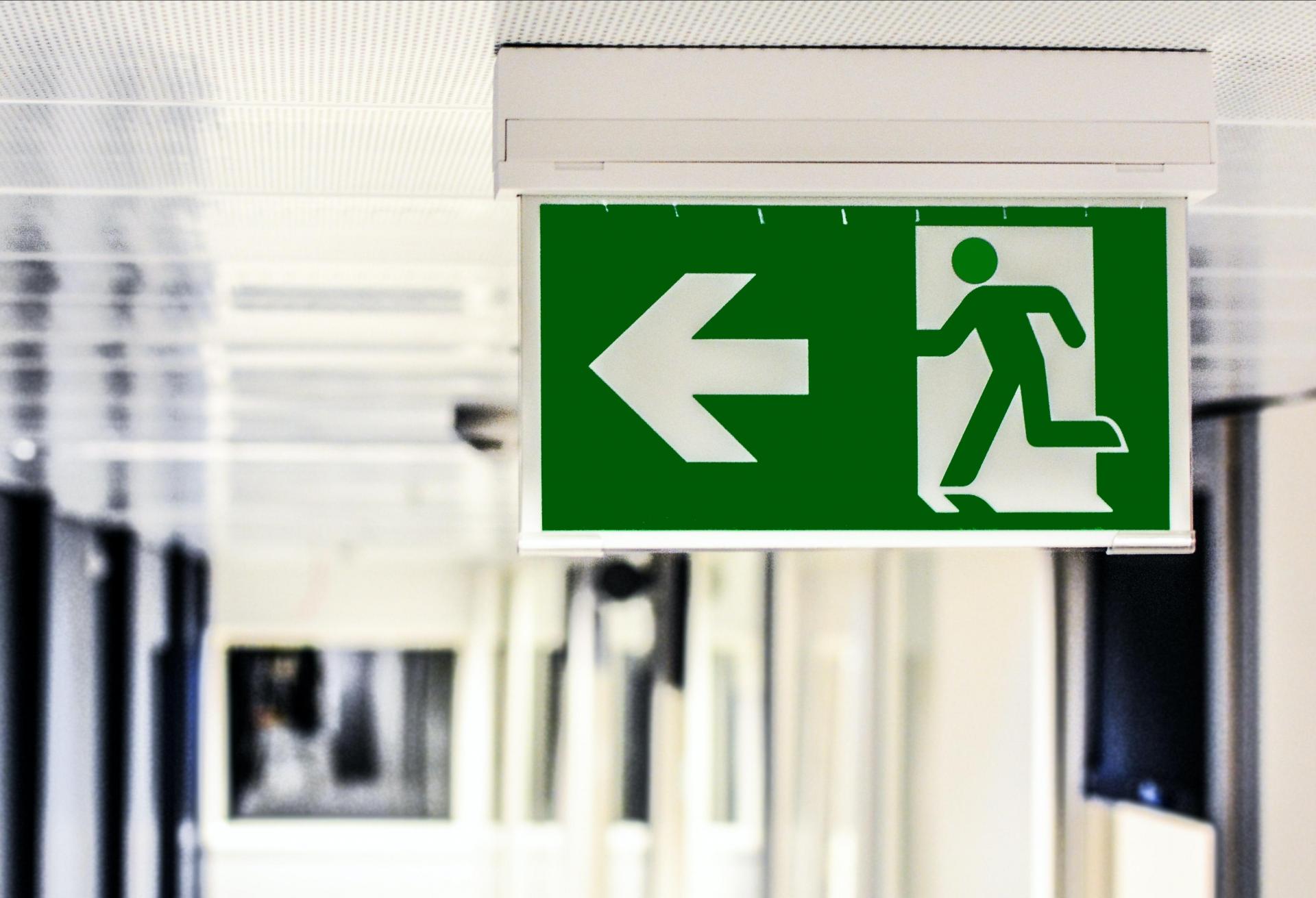 Exit Sign in Generic Office Stock Image