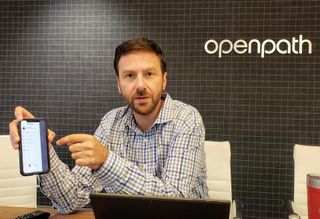 Openpath co-founder James Segil shows how using the Openpath mobile app could allow anyone access to a building. 