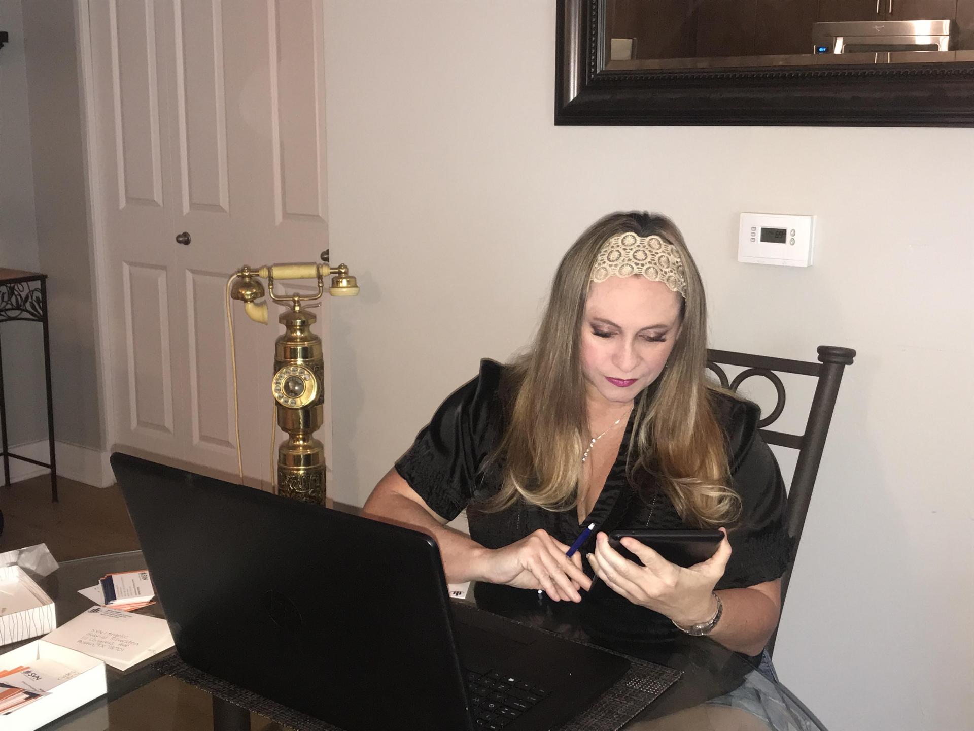 Melissa Swader at home at laptop
