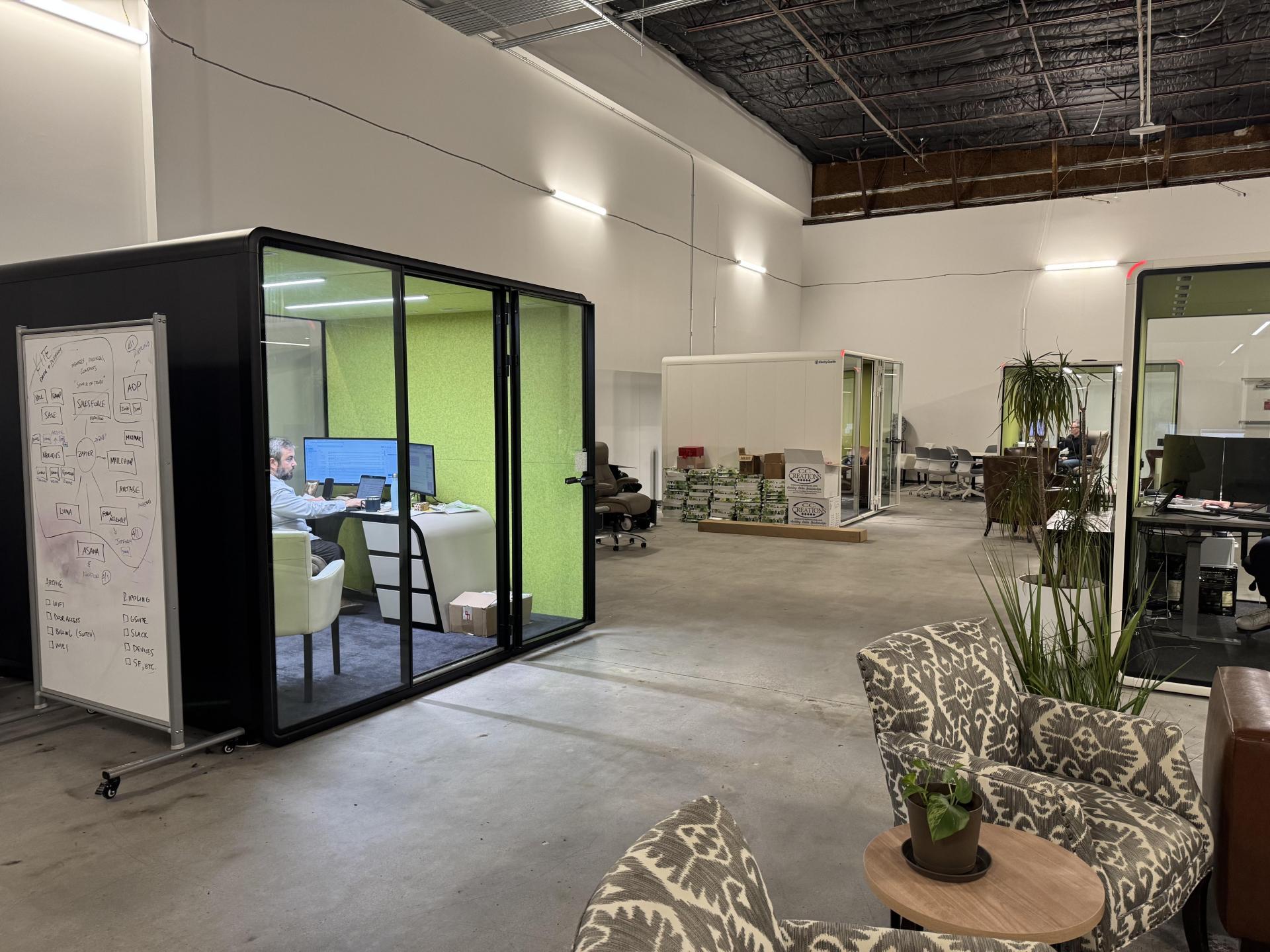 ClarityCastle modular office pods at Greentown Labs in Houston. Modular office spaces inside Greentown Labs