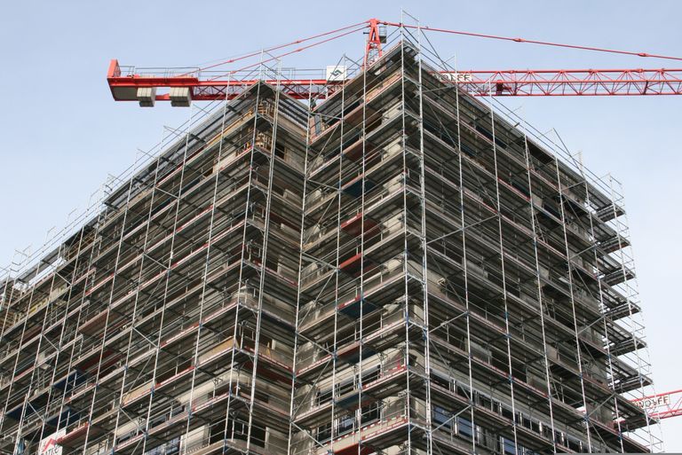 A tall building under construction.