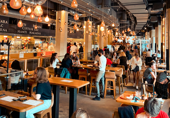 https://unsplash.com/photos/people-sitting-on-chair-in-restaurant-p85-MG66GRY