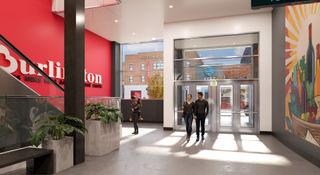 A modern store entrance with a red Burlington sign, potted plants, and a colorful mural. People are entering and exiting through glass doors.
