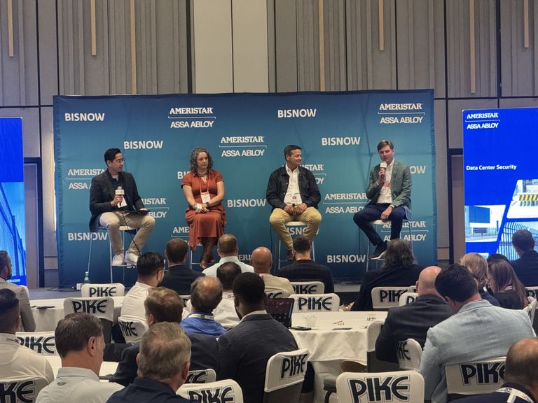 Greenberg Traurig's Shawn Ronda,  CleanArc Data Centers' Lindsey Bruner, Gigabit Fiber's Tom Spackman and Skybox Datacenters' Haynes Strader at Bisnow's DICE South in Arlington.