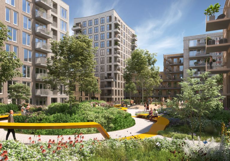 Modern apartment buildings surround a landscaped courtyard with walking paths, benches, lush greenery, and people enjoying the outdoor space.