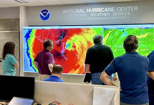 NHC NOAA officials watching Hurricane Helene landfall around 11:30 pm on Sept. 26, 2024