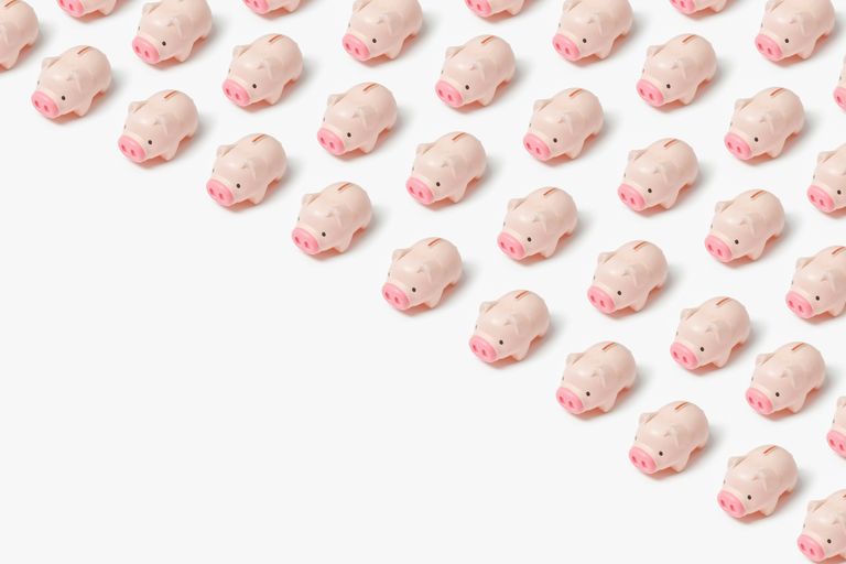 Rows of small, pink piggy banks arranged diagonally on a white background.