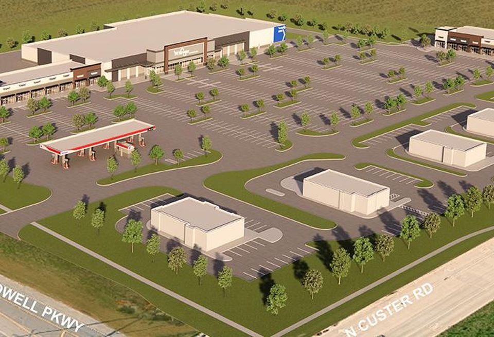 Rendering of a grocery-anchored shopping center.