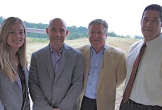 KLNB's Melissa Welch, Greenfield Partners' Jim Duszynski, and KLNB's Cary Judd and Dallon Cheney, snapped in 2011. Cary Judd died May 2016