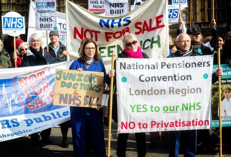 Protestors marching for the NHS 
