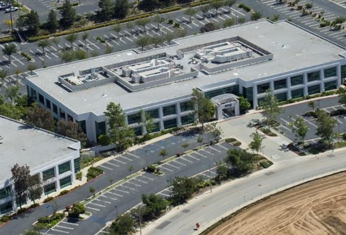 A former Amgen office campus sells for $23M.