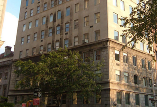 Corcoran Sues Woody Johnson's Ex-Wife Over $18M Condo Sale