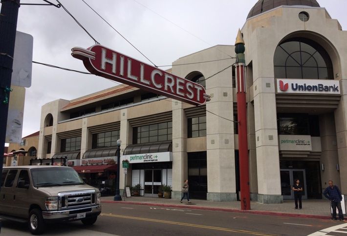 Pictured is the Hillcrest sign at the intersection of University and 4th avenues, Uptown's commercial district.