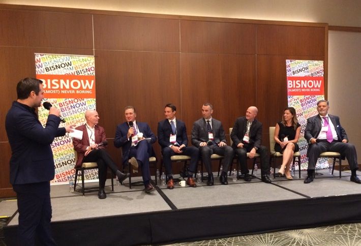Healthcare panel at Healthcare Leadership & Life Sciences Forum with Bisnow's Kyle Nicholes, left.