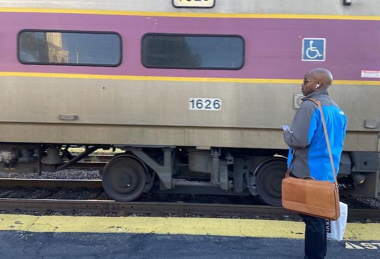 Commuter rail train pulling into West Medford station.
