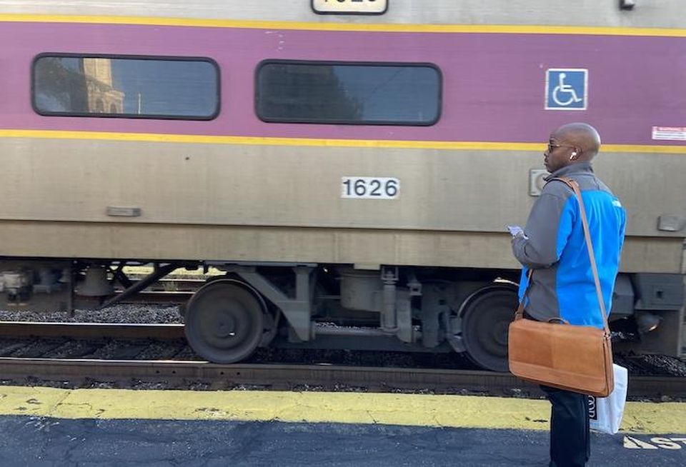 Commuter rail train pulling into West Medford station.