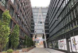 The central walkway connecting JBG Smith's 901 W and 900 W buildings in Shaw, photographed in April 2020. 