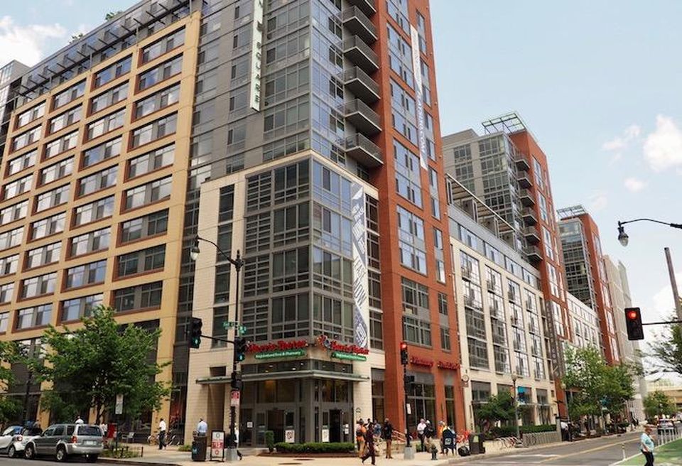 The Harris Teeter-anchored Flats 130 apartment building