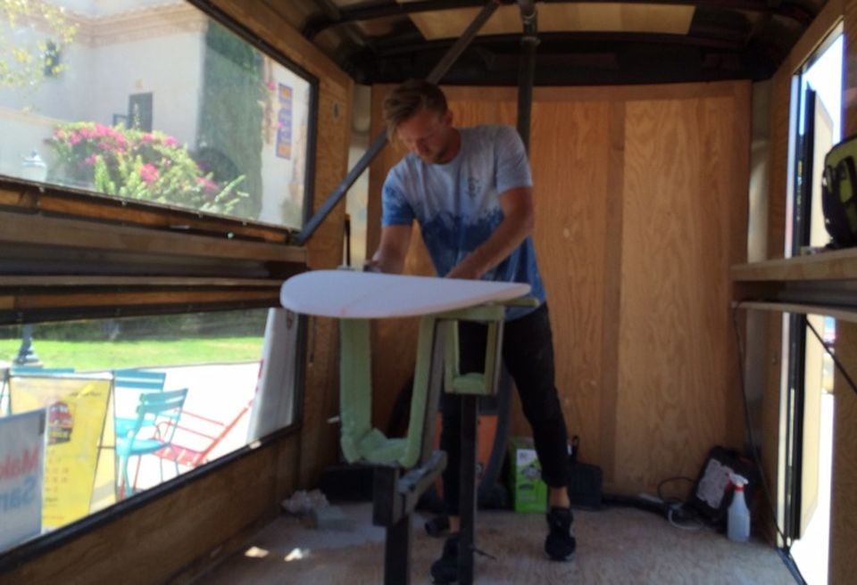 Surfboard shaper and instructor Chris Clark demonstrates his talent.