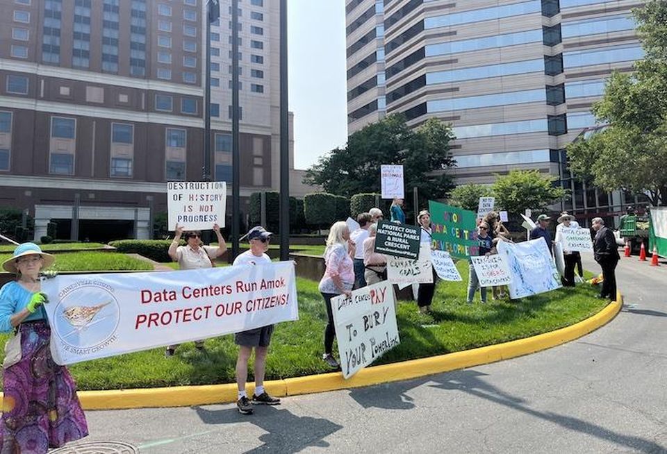 Northern Virginia data center opponents protesting outside of Bisnow's DICE East event in Tysons last month.