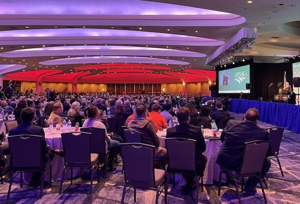 Hundreds of local officials packed into the ballroom at the Washington Hilton during President Joe Biden's address to the National Association of Counties.