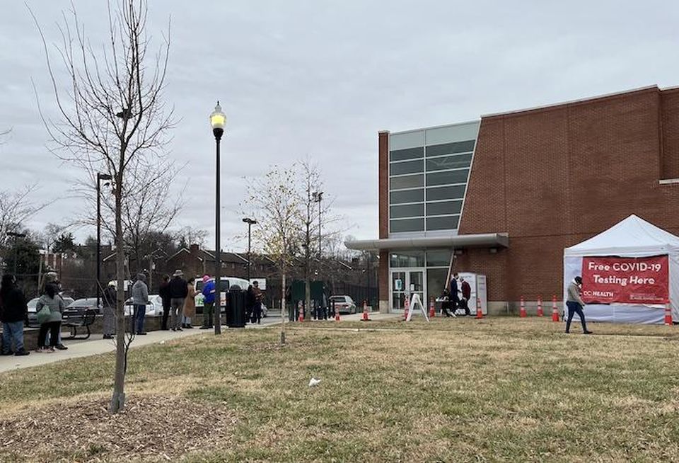 A line formed outside a covid testing center in Northeast D.C before it opened Saturday.